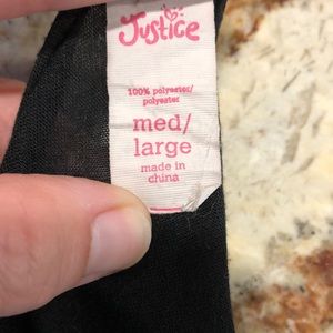 Kids justice vest size medium/ large